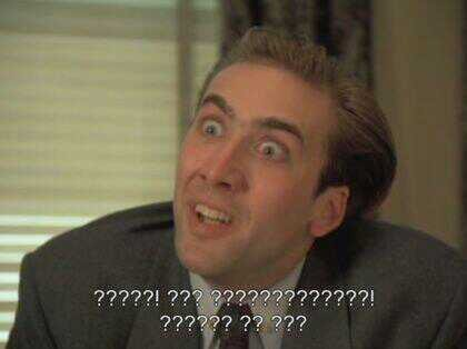 An image of Nicolas Cage raising countless question marks